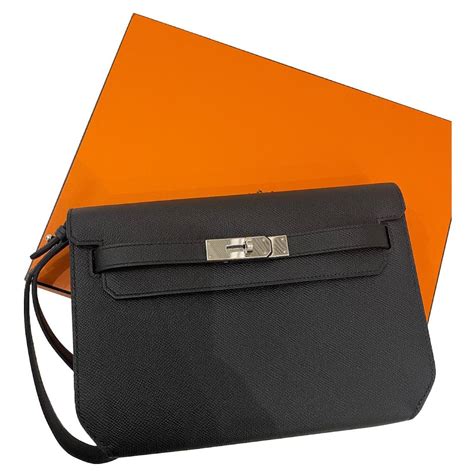 hermes male clutch|hermes clutch price list.